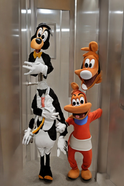 The Elevator Duel: A Tale of Two Disney Dogs